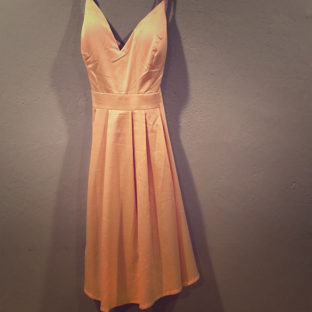 Silky pleated dress.